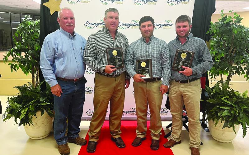 From left: County Agent Vince Deshotel, Ted Buller, Grant Fontenot, and Brad Fontenot.