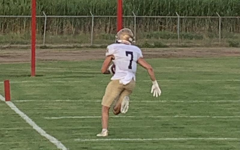 Sacred Heart wide receiver Hayden Droddy runs toward the goal line in the Trojans’ scrimmage against Bunkie. (Gazette photo by Rhett Manuel)