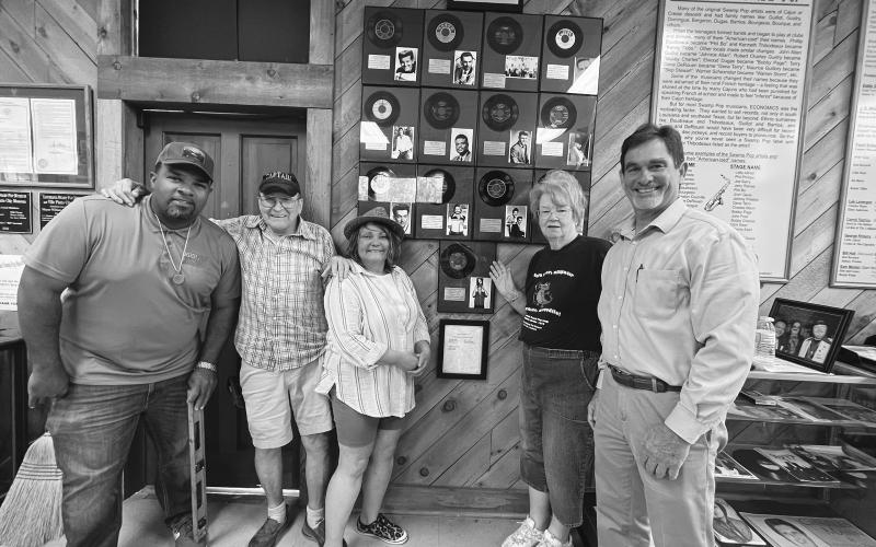 In the top right photo, from left, are Mayor Ryan Leday Williams, Allan, Donna Guillot, Sharon Fontenot and City Clerk Donald Bergeron.