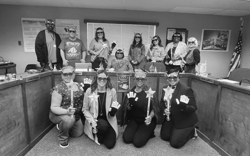 Coordinator Grace Sibley (seated center in the back row) poses with the judges. (Gazette photo by Heather Bogard)