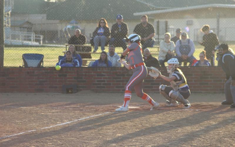 Khaki Olsen (7) waits for a pitch to cross the plate as her Pine Prairie Lady Panthers defeat Buckeye 6-4 Monday night. (Gazette photo by Rhett Manuel)