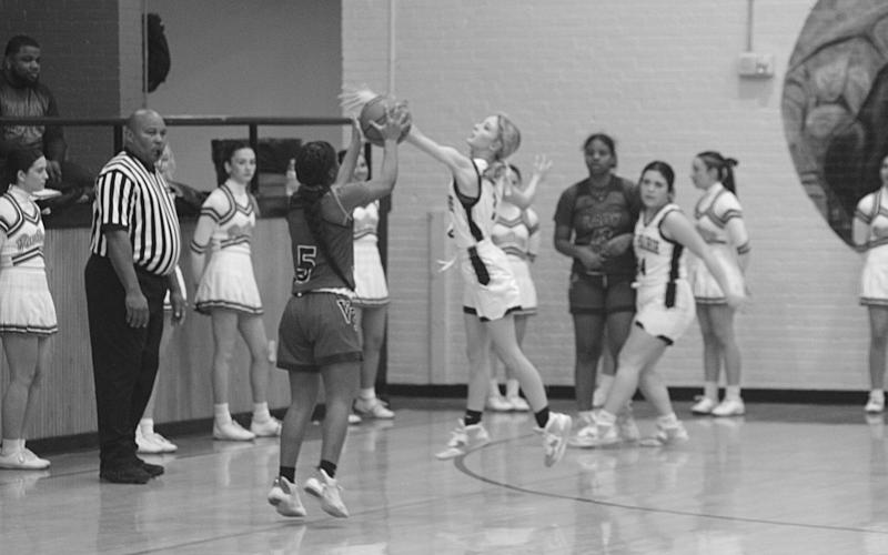 Ville Platte’s Destiny Lavigne attempts a shot while being defended during the Lady Bulldogs’ 44-9 blowout win on Tuesday night. (Gazette photo by Rhett Manuel)