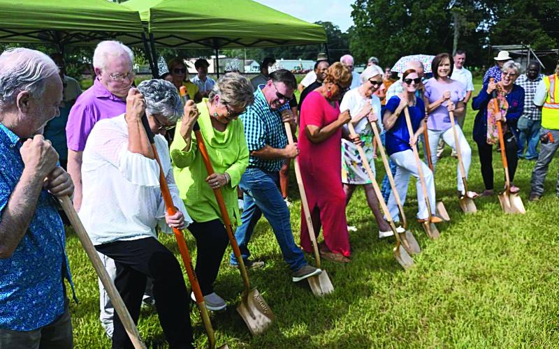 BREAKING GROUND - (from left) Ronnie Landreneau, parish engineer; Faye Langley, Basile representative on the parish library board; Bill Fontenot, parish engineering firm; Sandra Salazar, parish library board; Mark Denette, Basile mayor; Rella Joseph, parish library board; Gaynell Coates, parish library board; Meg Placke, state library director; Wesley Saunders, asst. parish library manager; Sherry Bergeron, Basile library branch manager; and Suzie Lemoine, parish library co-manager.