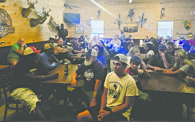 Students, parents, alumni, and fans of Oberlin High School are shown at the gathering held Sunday at the Crawfish Shack where they voiced concerns about the future of the Tiger football program.