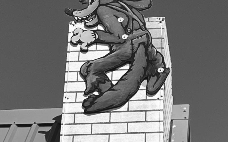 BIG BAD WOLF LOOKING OUT OVER MAMOU - Shown here, a close up of the Big Bad Wolf as he watches the Three Little Pigs down below. (Gazette photos by Heather Bogard)