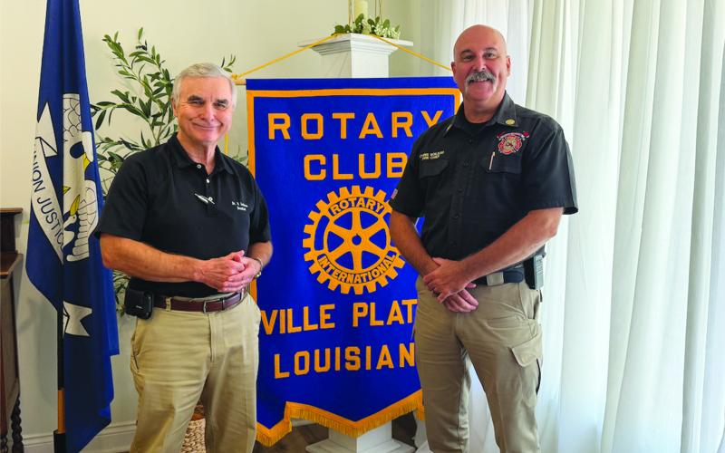 FIRE CHIEF SHARES UPDATE - During the July 21, meeting of the Ville Platte Rotary Club, Fire Chief Chris Soileau gave an update on plans for the new fire station to be located on Main Street, as well as fire safety tips and a brief history of the Ville Platte Fire Department. Soileau is shown with Rotary President Dr. Kirk Soileau (left). (Gazette photo by Heather Bogard)