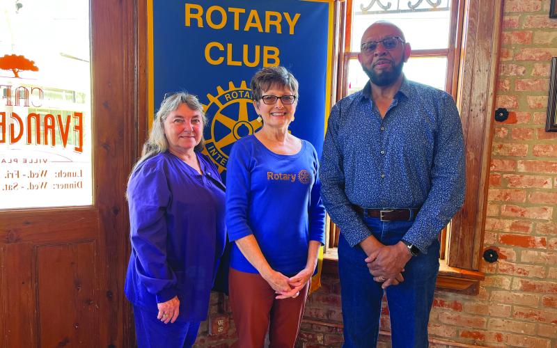 NEW MEMBERS SPEAK - During the January 18, meeting of the Ville Platte Rotary Club, new members Patricia Duplechin, left, and Clem LaFleur, right, addressed their fellow club members with a brief biographical talk introducing themselves to the club. They are shown with Rotarian and club board member Annette Johnson. (Gazette photo by Heather Bogard)