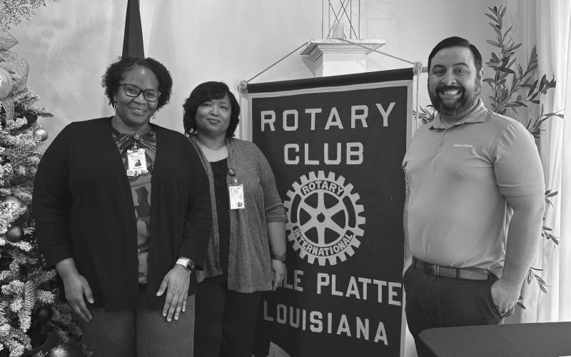 CASA VOLUNTEERS NEEDED - Shown, from left, are Madelyn Rosette and Annette Fruge with CASA and Rotary President Beau Wilson. (Gazette photo by Heather Bogard)