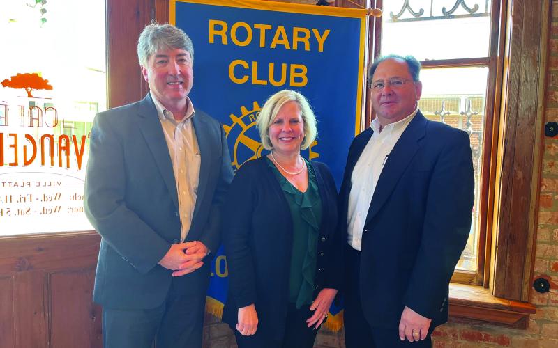 UPDATE PRESENTED - Heidi Melancon, director with the Louisiana Small Business Development Center, was the guest speaker for the January 11, meeting of the Ville Platte Rotary Club, She is shown with Rotary President Jimmy LeBlanc, left, and Rotarian Wayne Vidrine, right. (Gazette photo by Heather Bogard)