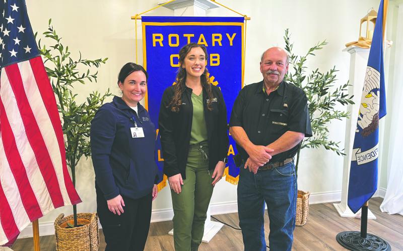 VACCINE INFORMATION SHARED - Morgan Hebert, a family nurse practioner at Mercy Regional Medical Center, (center) presented a brief talk on the importance of vaccines during the March 11, meeting of the Ville Platte Rotary Club. She is shown with Rotarian Ashlyn Ortego (left) and Rotary President Bob Manuel (right) (Gazette photo by Heather Bogard)