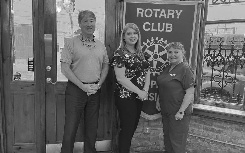 DUPLECHIN DISCUSSES ELDERLY HOUSING - Amanda Duplechin, property manage at Savoy Heights in Mamou, (center) addressed the March 22, meeting of the Ville Platte Rotary Club. She is shown with Rotary President Jimmy LeBlanc (left) and Rotarian Patricia Duplechin (righrt). (Gazette photo by Heather Bogard)