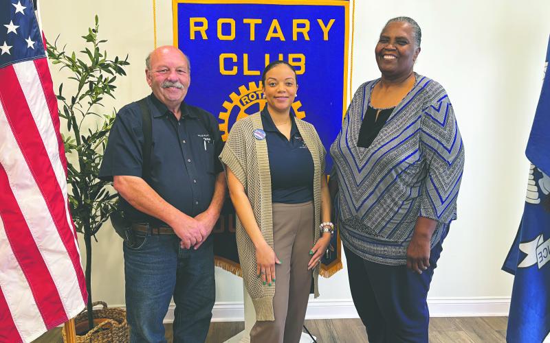 ROTARIANS LEARN ABOUT CASA - Alisha Arvie (center) shared the importance of the CASA organization to those youth in foster care during the March 25, meeting of the Ville Platte Rotary Club. She is shown with Rotary President Bob Manuel (left) and Rotarian Linda Fontenot (right). (Gazette photo by Heather Bogard)