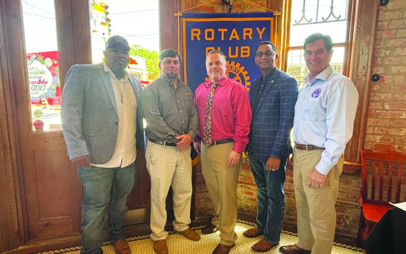 UPDATE ON BROADBAND SERVICE GIVEN -  LUS Interim Fiber Director Jeffery Stewart and Chief Engineer Eric Grimmet presented an update on fiber optic Internet services coming to Ville Platte starting in April. Shown, from left are Ville Platte Mayor and Rotarian Ryan Leday Williams, Grimmet, Stewart, Rotary President Brian Ardoin and Ville Platte City Clerk/Secretary-Treasurer Donald Bergeron. (Gazette photo by Heather Bogard)