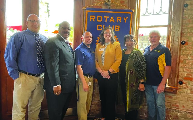 Shown, from left, are Kenneth Kidder (Basile High School teacher), Lazard, Patrick Guillory (assistant principal Evangeline Reimagine Academy), LeJeune, Grace Sibley (teacher of the year coordinator) and Rotary President Larry Lachney. (Gazette photo by Heather Bogard)