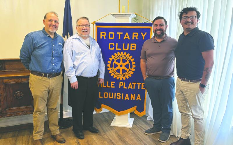 BAYOU CREATIVE VISITS ROTARY - Christopher Holmes and Jacob Ambriz with Bayou Creative addressed the March 31, meeting of the Ville Platte Rotary Club. Shown, from left, are Holmes, Rotarian Dan Poret, Rotary President Beau Wilson, and Ambriz. (Gazette photo by Heather Bogard)