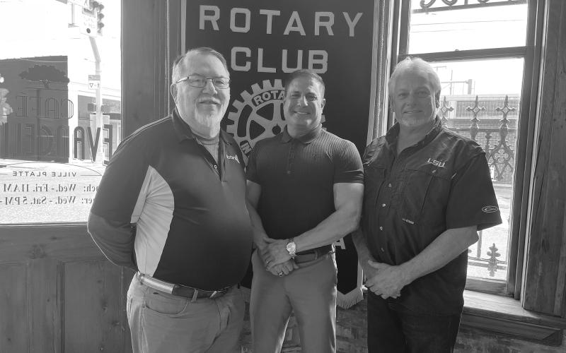 ROTARIANS WELCOME FONTENOT - Eric Fontenot was the guest speaker for the April 11, meeting of the Ville Platte Rotary Club. He is shown with Rotarian Dan Poret (left) and Rotary President Larry Lachney (right). (Gazette photo by Heather Bogard)