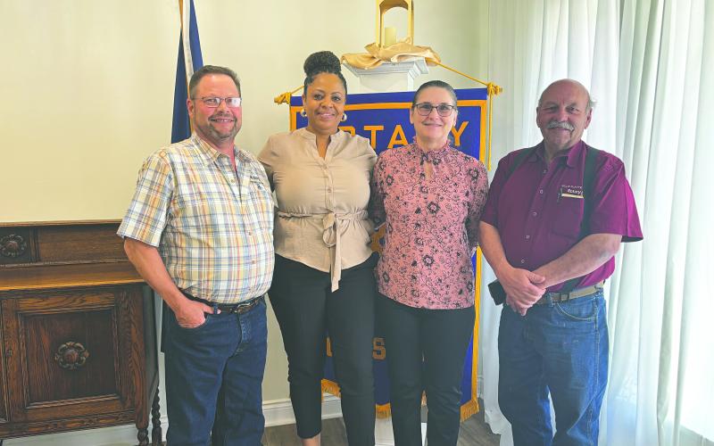 WELDING JOB PROSPECTS DISCUSSED - Rotarian Carleen Sylvester, during the April 22, meeting of the Ville Platte Rotary Club, invited welder Roddy Fontenot to discuss the welding industry. Shown, from left, are Fontenot, Sylvester, Katie McFarlin (SoLAcc student) and Rotary President Bob Manuel (right). (Gazette photo by Heather Bogard)
