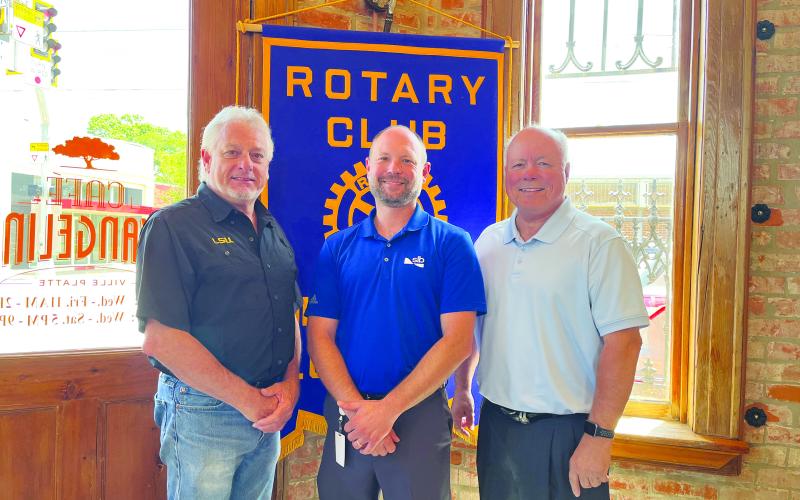 ROTARIANS HEAR UPDATE ON CAMERON - David Matthews, plant manager at SLB Cameron (center) was the guest speaker for the May 2, meeting of the Ville Platte Rotary Club. He is shown with Rotary President Larry Lachney (left) and Rotarian Dr. Hosea “Joey” Soileau (right). (Gazette photo by Heather Bogard)