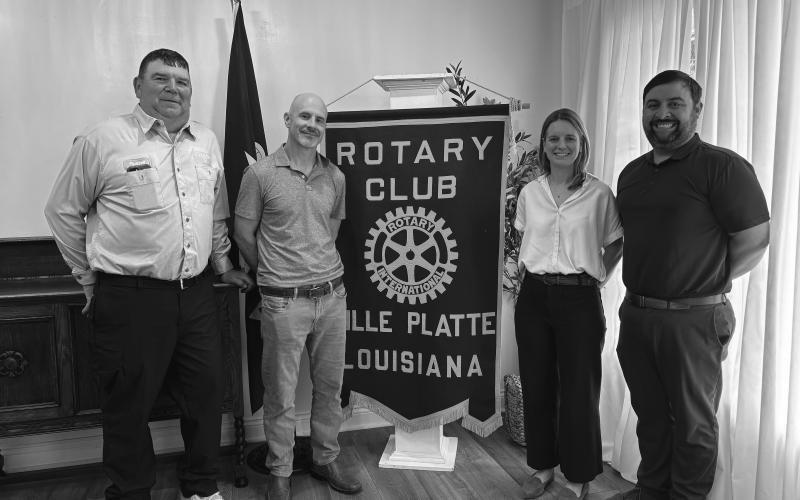 CHARM INDUSTRIAL SHARES UPDATE - During the May 6, meeting of the Ville Platte Rotary Club, members of Charmed Industrial addressed the group. Shown, from left, are Russell Marcantel, operations manager; Vince Green, chief development officer; Alison Kelman, community engagement officer; and Rotary President Beau Wilson. (Gazette photo by Heather Bogard)
