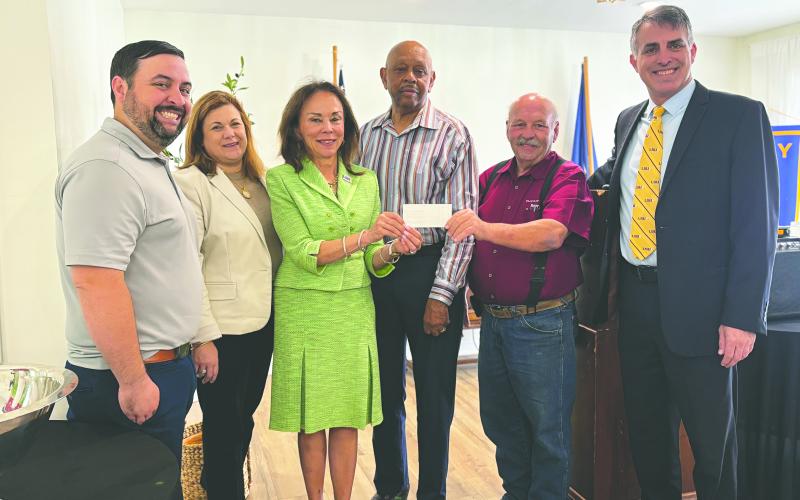 LSUE SCHOLARSHIP PRESENTED - During the May 6, meeting of the Ville Platte Rotary Club, the group presented its annual LSUE Scholarship donation to the school. Shown, from left, are Rotarian Beau Wilson; Carey Lawson, Executive Director of the LSUE Foundation; Dr. Nancee Sorenson, Chancellor of LSUE; Rotarian Clem LaFleur; Rotary President Bob Manuel; and Dr. John Hamlin, Vice Chancellor for Academic Affairs at LSUE. (Gazette photo by Heather Bogard)