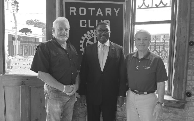DR. WILSON ADDRESSES ROTARIANS - Louisiana DOTD Secretary Dr. Shawn Wilson (center) was the guest speaker for the May 16, meeting of the Ville Platte Rotary Club. He is shown with Rotary President Larry Lachney (left) and Rotarian Dr. Kirk Soileau (right). (Gazette photo by Heather Bogard)