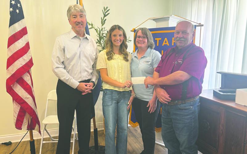 PPHS GRADUATE SHARES FUTURE PLANS - During the May 27. meeting of the Ville Platte Rotary Club, Grace Holsomback, a 2025 graduate of Pine Prairie High School, discussed her hobbies and future plans with the club. Shown, from left, are Rotarian Jimmy LeBlanc, Grace Holsomback, Grace’s mother Lori Holsomback and Rotary President Bob Manuel. (Gazette photo by Heather Bogard)