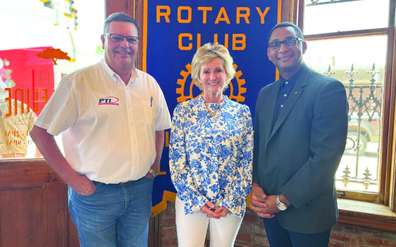 LEGISLATIVE UPDATE GIVEN -  State Representative Rhonda Butler (center)presented an update on the recent legislative session in Baton Rouge to the members of the Ville Platte Rotary during the group’s June 11, meeting. She is shown with Rotarian Mitch Fontenot (left) and Rotary President Brian Ardoin (right). (Gazette photo by Heather Bogard)