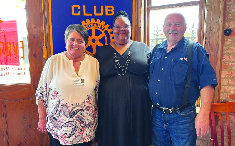 ECAA SERVICES DISCUSSED -  ECAA Executive Director Carleen Bellard (center) shared the community outreach and services provided by ECAA throughout the parish with members of the Ville Platte Rotary Club during the group’s June 25, meeting. She is shown with Rotarian Mable Foreman (left) and Rotary President Bob Manuel (right). (Gazette photo by Heather Bogard)