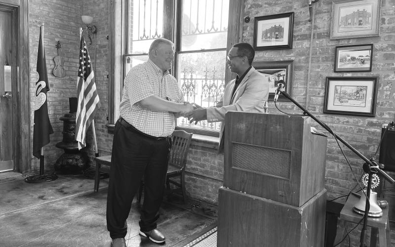 PAUL HARRIS PIN PRESENTED - Rotarian Peter Strawitz (left) received a four-time blue sapphire Paul Harris Fellow pin from Rotary President Brian Ardoin. (Gazette photos by Heather Bogard)