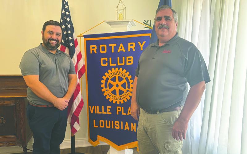 SMITH SHARES UPDATE ON AIR CONDITIONING INDUSTRY - Rotarian Scott Smith shared information on the air conditioning industry during the July 22, meeting of the Ville Platte Rotary Club. He is shown with Rotary President Beau Wilson (left). (Gazette photo by Heather Bogard)