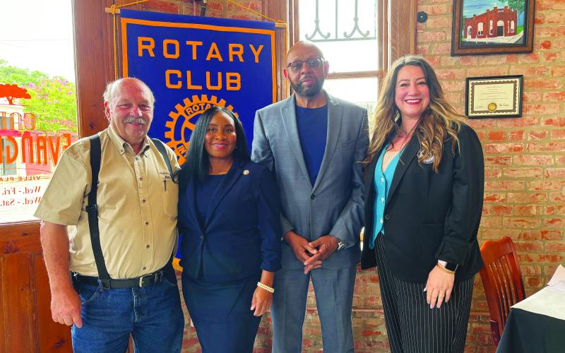 CHILDREN’S TRUST FUND WORK SHARED - Shown, from left, are Rotary President Bob Manuel; guest speaker Ursula Anderson, Executive Director of the Louisiana Children’s Trust Fund; Rotarian Clem LaFleur; and guest speaker Amanda Shackelford with LYFE.  (Gazette photo by Heather Bogard)