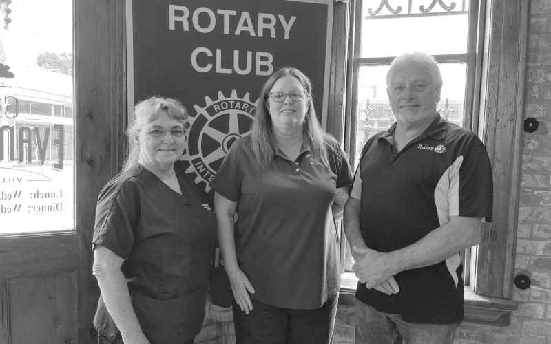 911 UPDATE GIVEN - Evangeline Parish 911/OEP Director Liz Hill addressed the July 26, meeting of the Ville Platte Rotary Club. She is shown with Rotarian Patricia Duplechin (left) and Rotary President Larry Lachney (right). (Gazette photo by Heather Bogard)