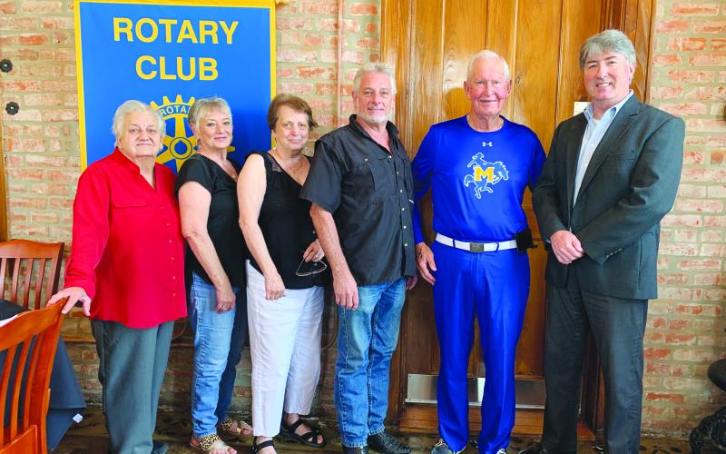 VP ROTARY WELCOMES SPEAKER - Coach Barney Bridges, second from right, was the guest speaker for the July 27, meeting of the Ville Platte Rotary Club. He is shown with, from left, family members Julia Ortego, Debbie Guillory, Georgie Vidrine, board member Larry Lachney and Rotary President Jimmy LeBlanc. (Gazette photos by Heather Bogard)