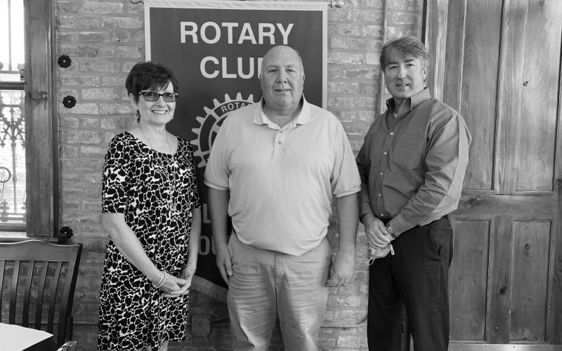 VP ROTARY WELCOMES SPEAKER - Rotarian Annette Johnson, left, welcomed Pat Derouselle, Executive Director with the Evangeline Parish Solid Waste Commission, center, as the guest speaker for the August 10, meeting of the Ville Platte Rotary Club. They are shown with Rotary President Jimmy LeBlanc, right. (Gazette photo by Heather Bogard)
