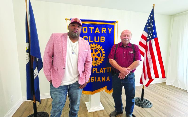 CRIME PREVENTION EFFORTS DISCUSSED -  Ville Platte Mayor Ryan LeDay Williams (left) addressed the August 20, meeting of the Ville Platte Rotary Club with an update on crime prevention plans. He is shown with Rotary President Bob Manuel (right). (Gazette photo by Heather Bogard)