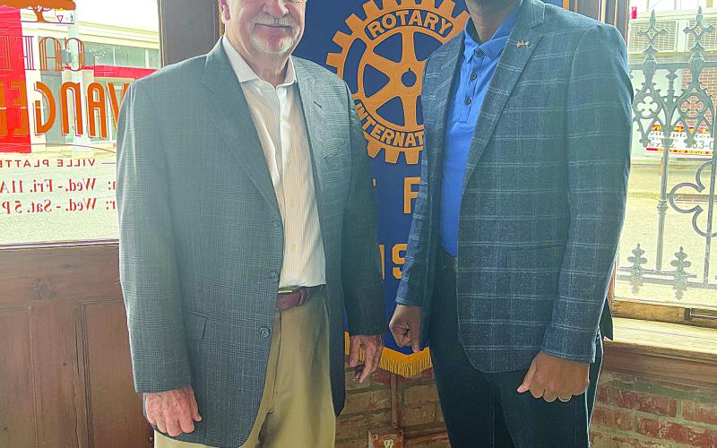 WARD DISCUSSES IDB BOARD - Dr. William “Tojo” Ward with the Industrial Development Board (left) was the guest speaker for the August 29, meeting of the Ville Platte Rotary Club. He is shown with Rotary President Brian Ardoin. (Gazette photo by Heather Bogard)