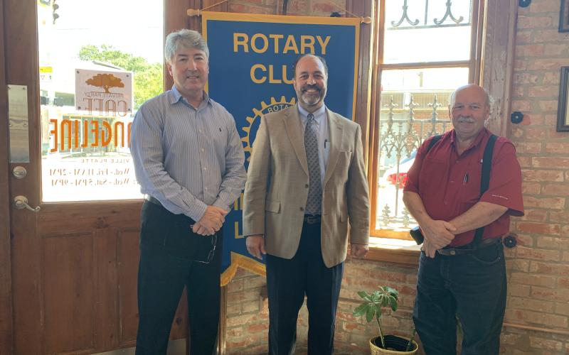 VP ROTARY WELCOMES GUEST - Raymond Hebert, President and CEO of the Community Foundation of Acadiana, center, was the guest speaker for the August 31, meeting of the Ville Platte Rotary Club. He is shown with Rotary President Jimmy LeBlanc, left, and Rotarian Bob Manuel, right. (Gazette photo by Heather Bogard)