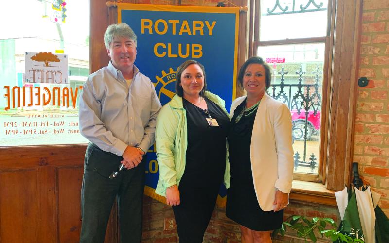 VP ROTARY WELCOMES AGUILLARD - Candace Aguillard, center, was the guest speaker for the September 14, meeting of the Ville Platte Rotary Club. She is shown with Rotary President Jimmy LeBlanc, left, and Rotary Secretary Renee Brown, right. (Gazette photo by Heather Bogard)