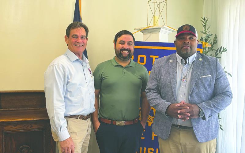 MAYOR SHARES POSITIVE UPDATES - Ville Platte Mayor and Rotarian Ryan LeDay Williams shared positive news on the City of Ville Platte during the September 16, meeting of the Ville Platte Rotary Club. He is shown with City Clerk and Rotarian Donald Bergeron (left) and Rotary President Beau Wilson (center). (Gazette photo by Heather Bogard)