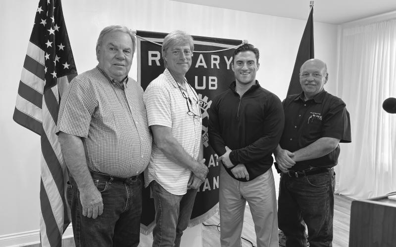 ORTHOPEDIC SURGEON VISITS ROTARY CLUB - Orthopedic surgeon Stuart Schexnayder addressed the September 24, meeting of the Ville Platte Rotary Club. Shown, from left, are Rotarian Steve Phillips, Paul Schexnayder, Stuart Schexnayder and Rotary President Bob Manuel (right). (Gazette photo by Heather Bogard)