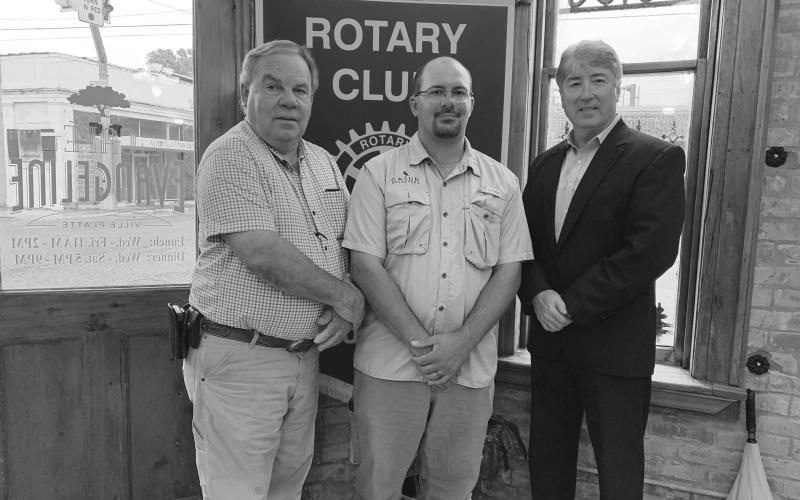 VP ROTARY WELCOMES GUEST - Ian Fontenot with Cajun Broadband, center, was the guest speaker for the September 28, meeting of the Ville Platte Rotary Club. He is shown with Rotarian Steve Phillips, left, and Rotary President Jimmy LeBlanc, right. (Gazette photo by Heather Bogard)