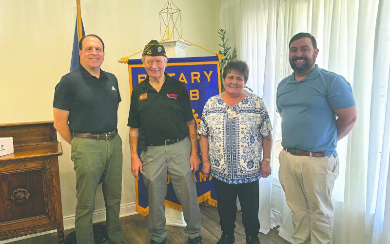 TRENCHARD SHARES WORK WITH VETERANS - From left are City Clerk/Treasurer and Rotarian Darin Bordelon, guest speaker Chuck Trenchard, Rotarian Mable Foreman, and Rotary President Beau Wilson at the October 7, meeting of the Ville Platte Rotary Club. (Gazette photo by Heather Bogard)