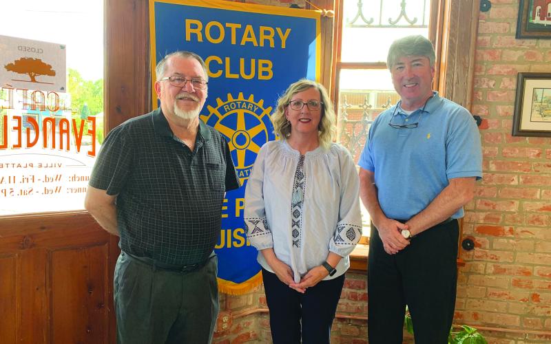 DEEN VISITS WITH VP ROTARY CLUB - Rotarian Dan Poret, left, welcomed Lisa Deen, center, as the guest speaker for the October 12, meeting of the Ville Platte Rotary Club. They are shown with Rotary President Jimmy LeBlanc, right. (Gazette photo by Heather Bogard)