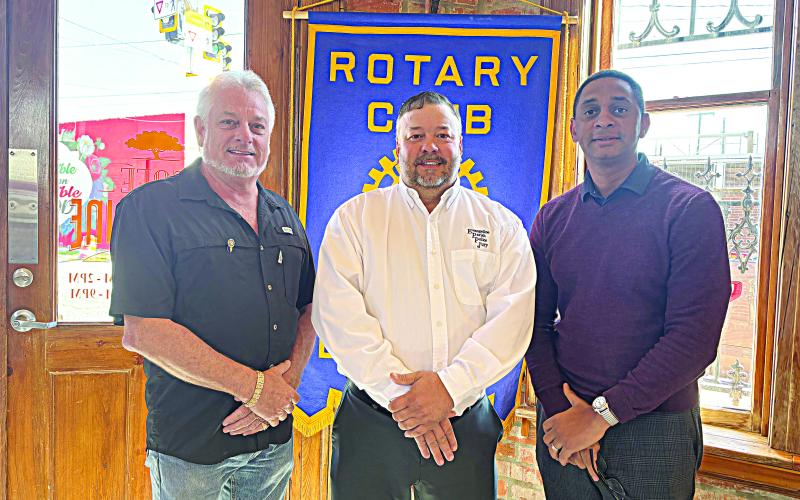 VIDRINE IS GUEST SPEAKER - EPPJ President Bryan Vidrine (center) was the guest speaker for the October 17, meeting of the Ville Platte Rotary Club. He is shown with Rotarian Larry Lachney (left) and Rotary President Brian Ardoin. (Gazette photo by Heather Bogard)