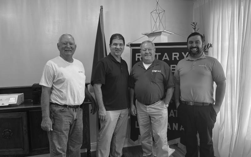 SENIOR LIVING DISCUSSED - From left are Rotarian Brent Coreil, Eric Fruge and Landie Thompson with Chateau des Amis and Rotary President Beau Wilson. Fruge and Thompson talked about active living in a senior apartment. (Gazette photo by Heather Bogard)