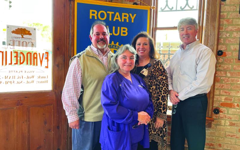 NURSING HOME UPDATE GIVEN - Heritage Manor Administrator and Rotarian Trey Prudhomme, left, was the guest speaker for the November 9, meeting of the Ville Platte Rotary Club. He is shown with, from left, Heritage Manor Activity Director Patricia Duplechin, Rotary Secretary Renee Brown and Rotary President Jimmy LeBlanc. (Gazette photo by Heather Bogard)