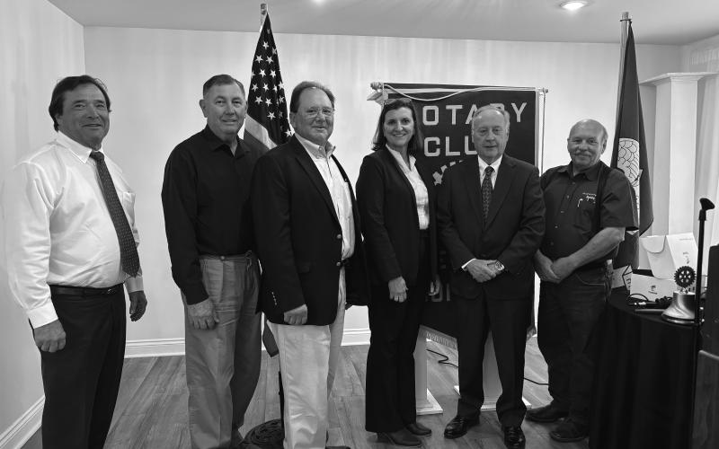 LBA UPDATES DISCUSSED - LBA CEO Ginger Laurent visited the November 26, meeting of the Ville Platte Rotary Club. From left are David Thibeaux, Rotarians Bill Brunet and Wayne Vidrine, Laurent, Randy Chapman and Rotary President Bob Manuel. (Gazette photo by Heather Bogard)