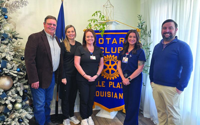 IN-PATIENT REHAB BENEFITS SHARED - Shown, from left, are Rotarian Mitch Fontenot, Sara LaFleur, Tiffany Leger, Kayla Stelly and Rotary President Beau Wilson. (Gazette photo by Heather Bogard)