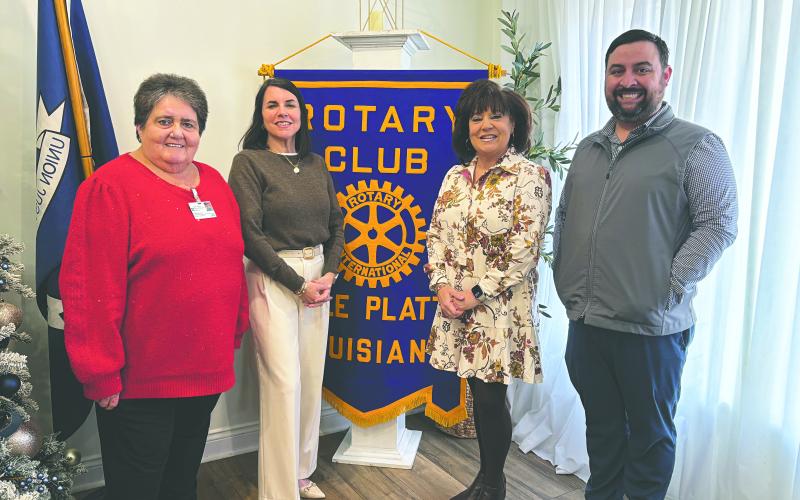 EVANGELIZING MISSION IS SHARED- Shown, from left, are Rotarian Mable Foreman, Kristi Johnson, Monette Richardson and Rotary President Beau Wilson. (Gazette photo by Heather Bogard)