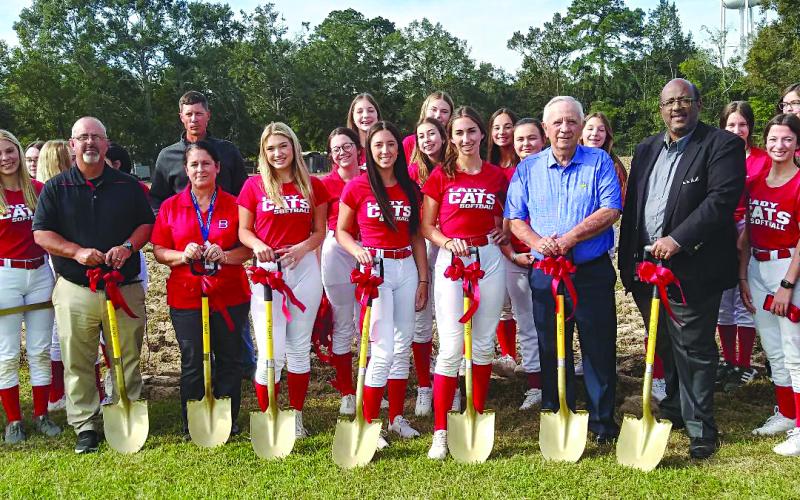 The sun was shining brightly on the golden shovels at the ceremonial groundbreaking ceremony for the Basile High Lady Cat softball field.  Pictured with shovels are (from left to right) are Kevin Bertrand, Basile High athletic director; Helana Francois, Basile High principal; Alli Chaumont, Hanna Manuel, and Henley LeJeune, Lady Cat softball team captains; Wayne Dardeau, EPSB president; and Darwan Lazard, EPSB superintendent.